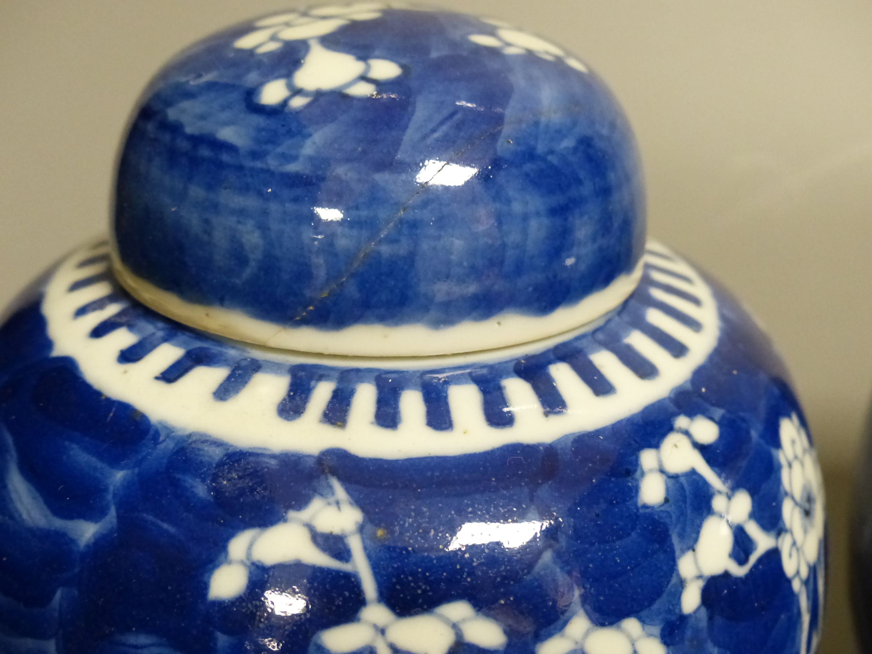 Three Chinese blue and white prunus jars, late 19th century/early 20th century